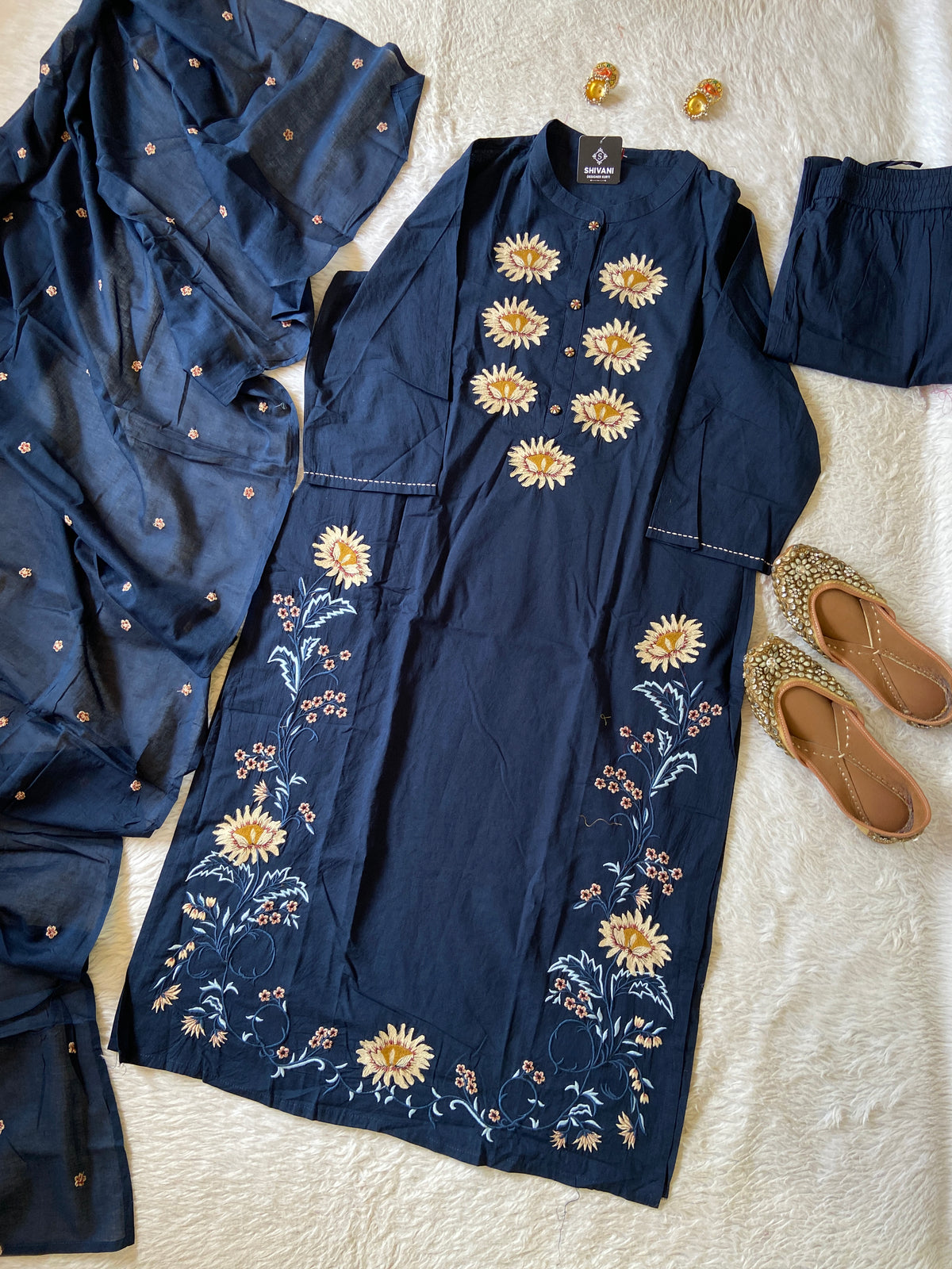 Flower Embroidery Work Cotton Straight Kurti, Pant And Dupatta. Cotton Suit Sets For Women Online India. Shop the Latest Festive Summer Collection at Shivani Designer Kurti.