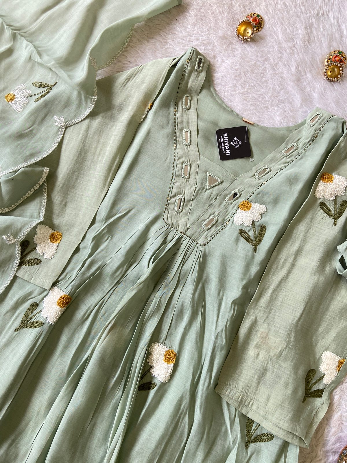 Mirror Work V-Neck With Flower Work Embroidery, Aline Kurti (Full Lining) With Pant And Dupatta. Silk Suit Sets For Women Online India. Shop the Latest Festive Summer Collection at Shivani Designer Kurti.