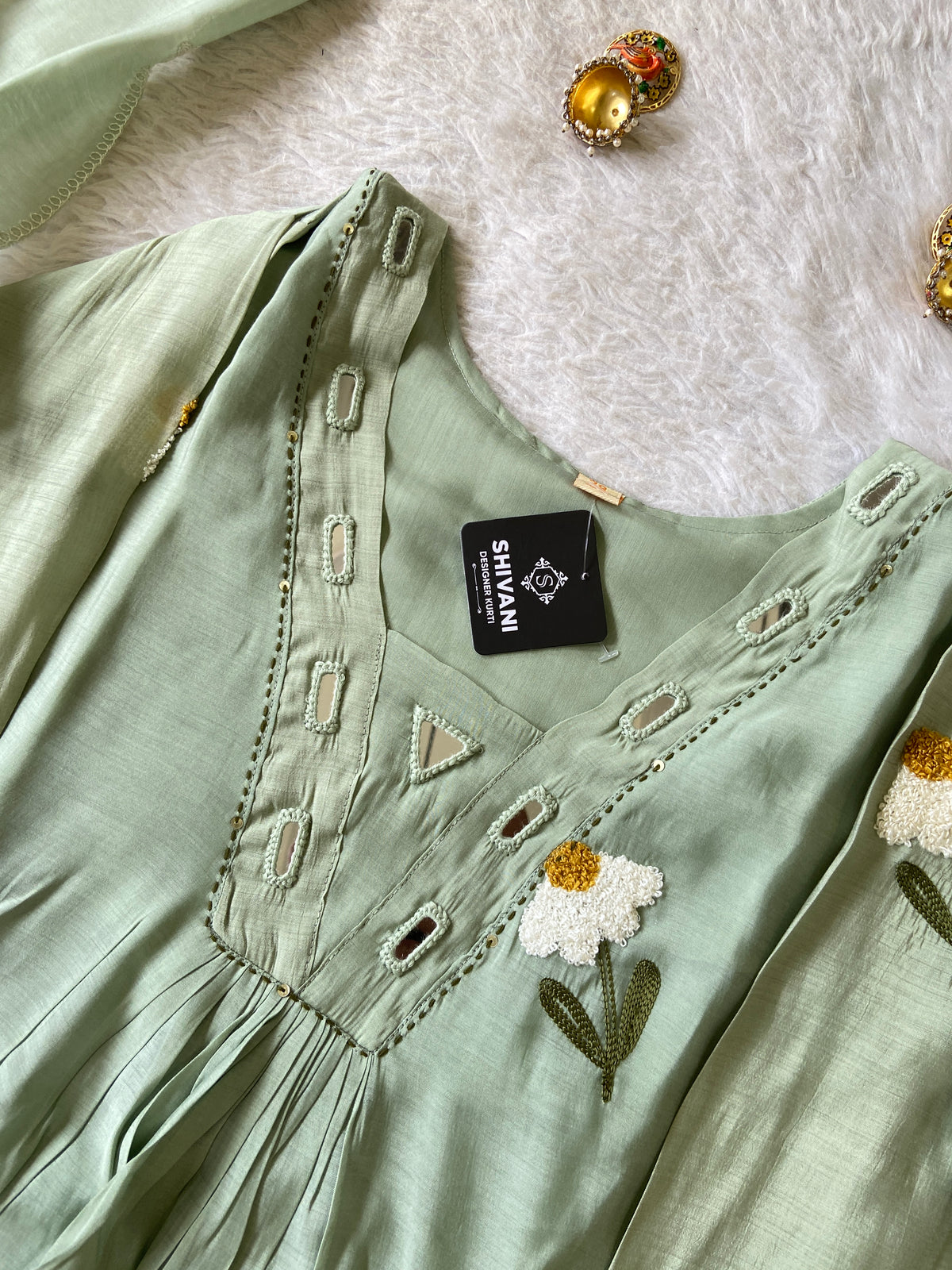 Mirror Work V-Neck With Flower Work Embroidery, Aline Kurti (Full Lining) With Pant And Dupatta. Silk Suit Sets For Women Online India. Shop the Latest Festive Summer Collection at Shivani Designer Kurti.