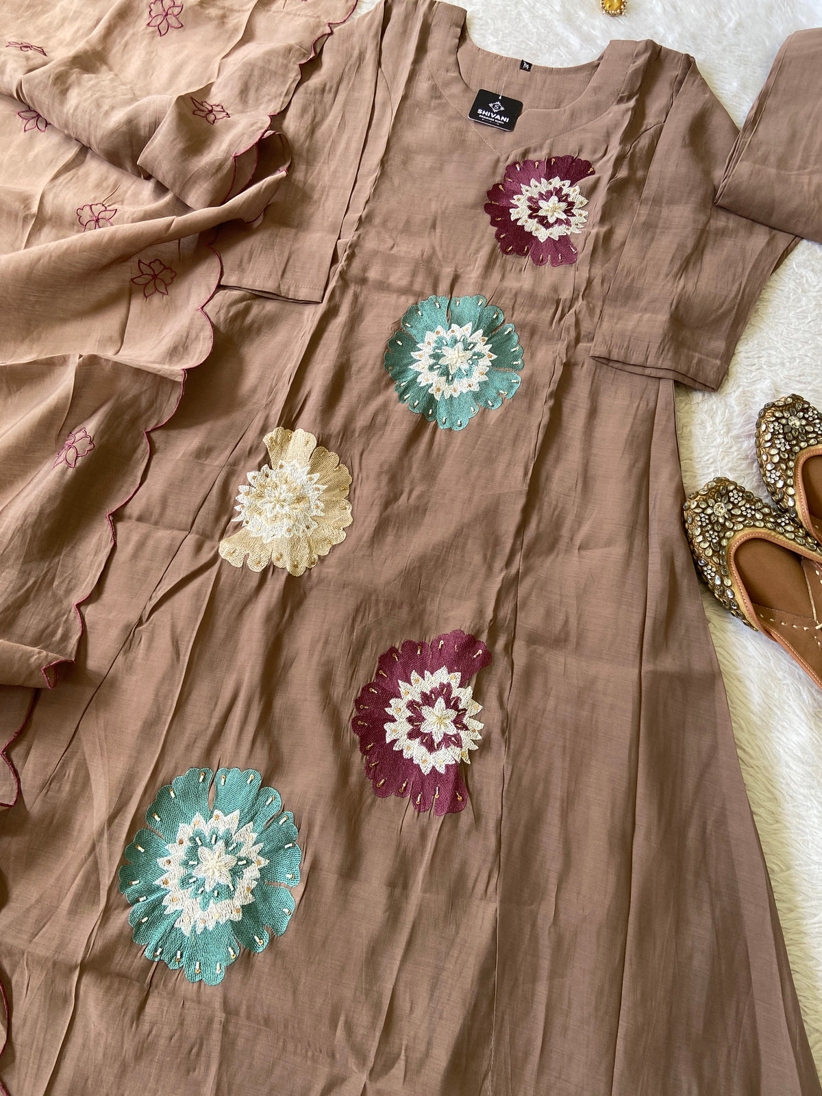 Beautiful Flower Embroidery Work In Aline Kurti With Semi Palazzo And Dupatta. Silk Suit Sets For Women Online India. Shop the Latest Festive Summer Collection at Shivani Designer Kurti.