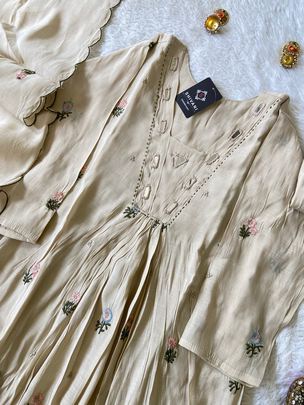 Mirror Work V-Neck With Flower Work Embroidery, Aline Kurti (Full Lining) With Pant And Dupatta. Silk Suit Sets For Women Online India. Shop the Latest Festive Summer Collection at Shivani Designer Kurti.
