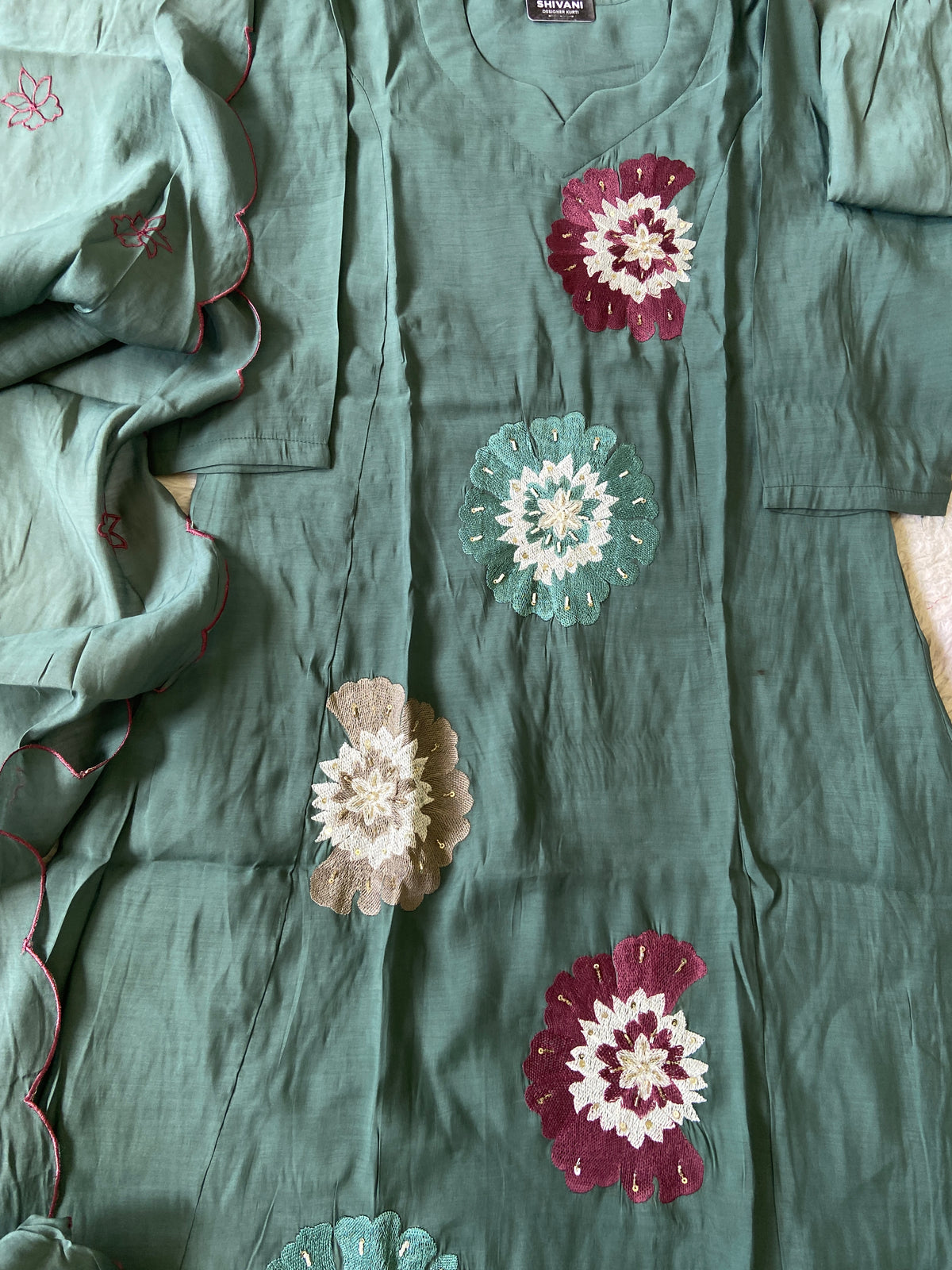 Beautiful Flower Embroidery Work In Aline Kurti With Semi Palazzo And Dupatta. Silk Suit Sets For Women Online India. Shop the Latest Festive Summer Collection at Shivani Designer Kurti.