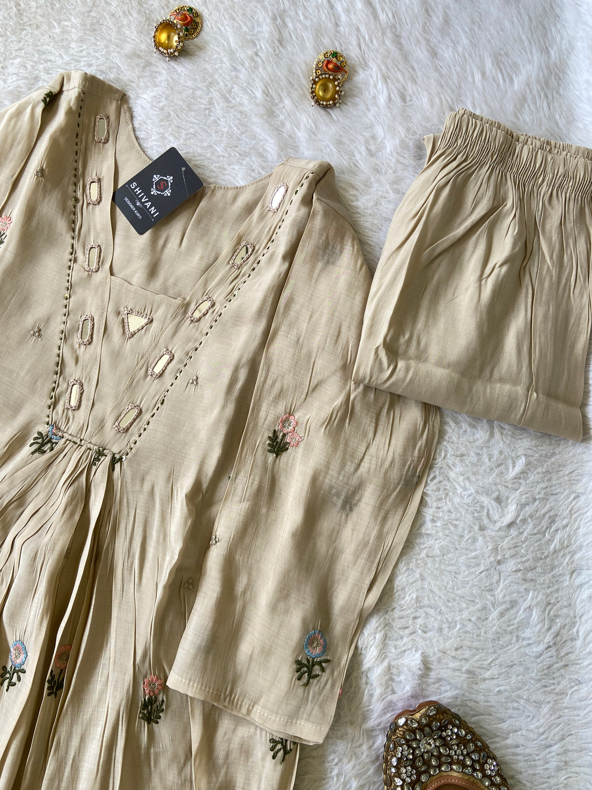 Mirror Work V-Neck With Flower Work Embroidery, Aline Kurti (Full Lining) With Pant And Dupatta. Silk Suit Sets For Women Online India. Shop the Latest Festive Summer Collection at Shivani Designer Kurti.